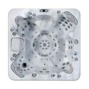 Spa Minorque 6 places blanc marbre installé en extérieur sur terrasse